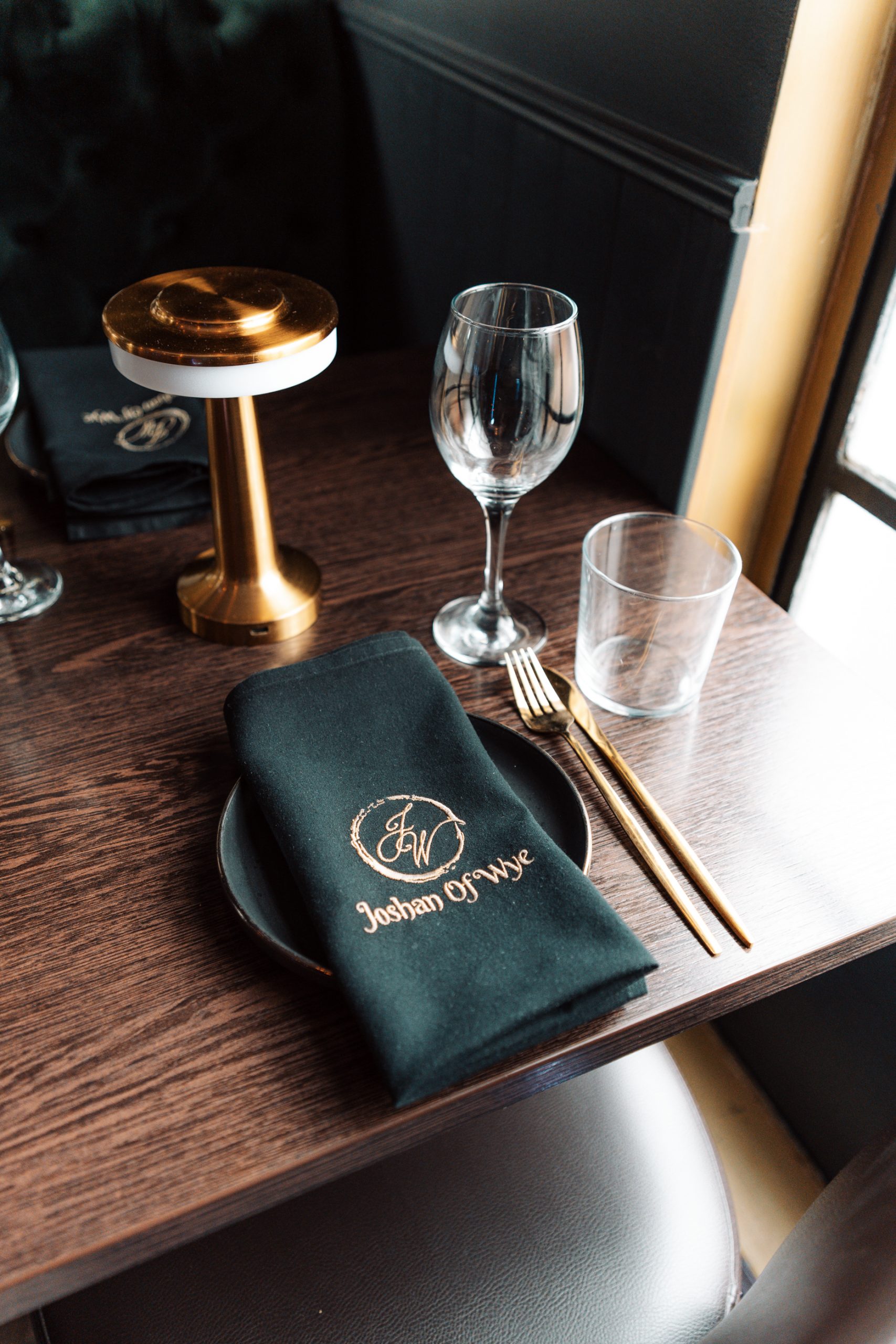 Joshan of Wye Indian restaurant elegant table setting with embroidered napkin, Ashford