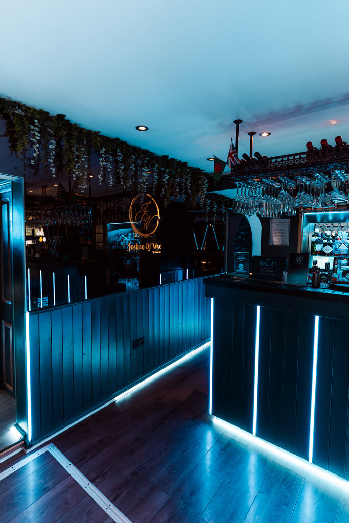 Illuminated bar counter with blue LED lighting at Joshan of Wye, Ashford
